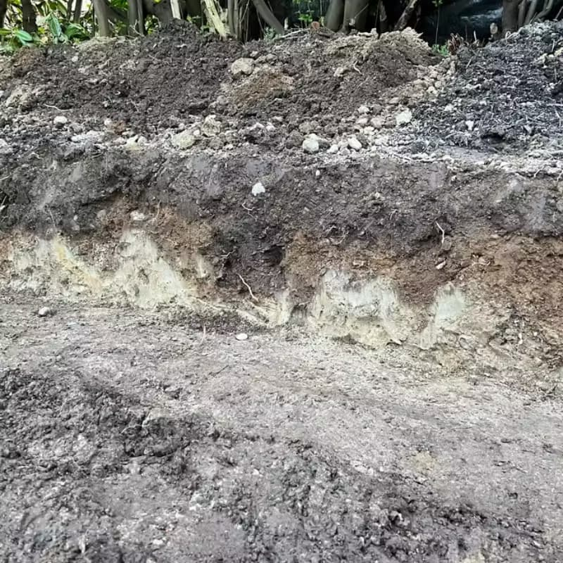 Layers of compacted clay soil.